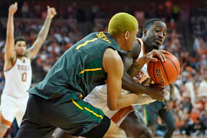 Texas Longhorns guard Courtney Ramey (3) battles for the loose ball with Baylor Bears forward Jeremy Sochan (1) during the second half at Frank C. Erwin Jr. Center.